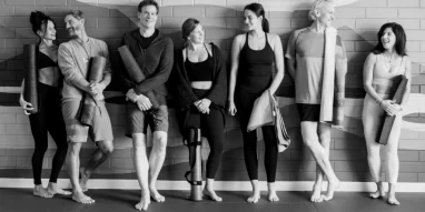 Group of yoga students at yogafusion yoga Adelaide studio enjoying the $59 unlimited yoga intro month and supportive studio atmosphere